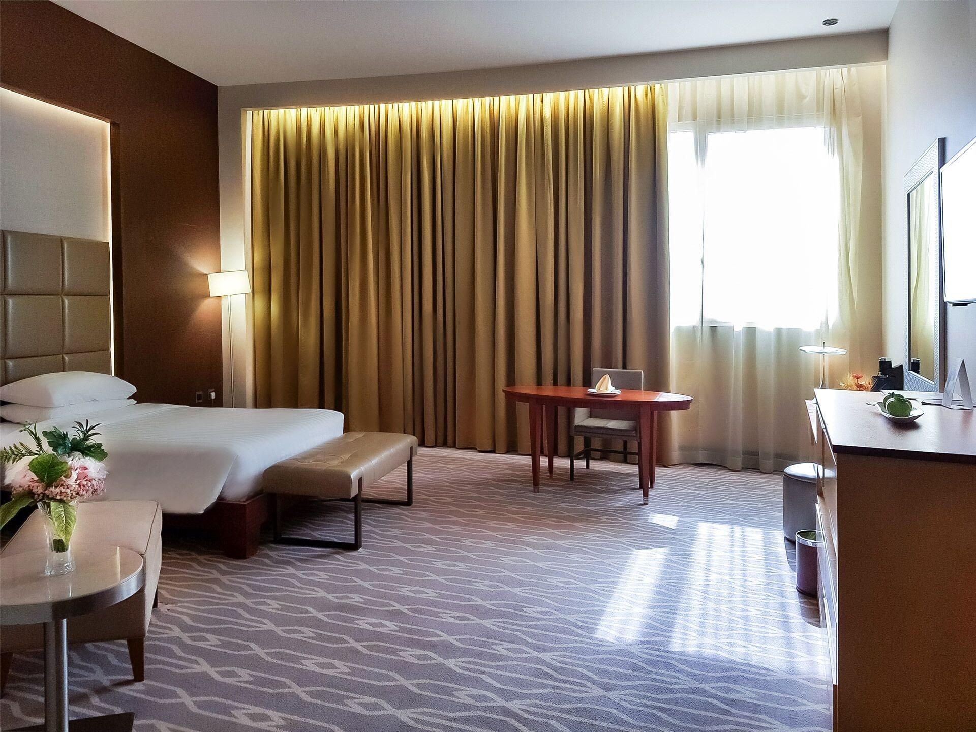 Millennium Hail Hotel Exterior foto A room at the hotel