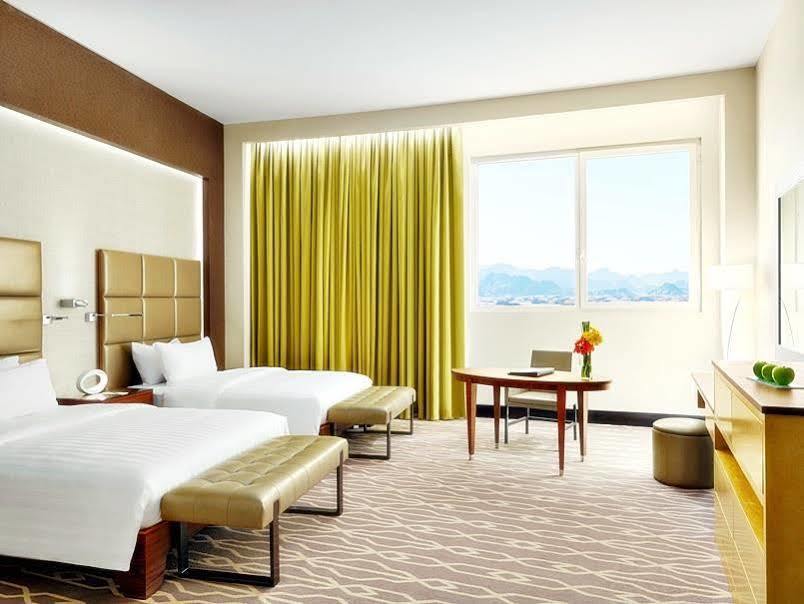 Millennium Hail Hotel Exterior foto A guest room at the MGM Grand
