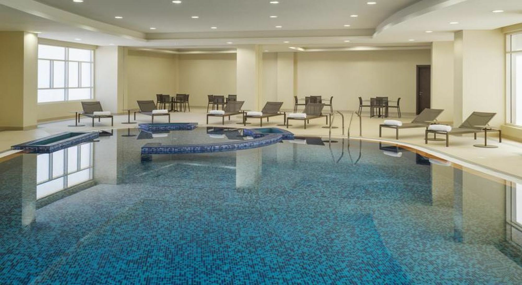 Millennium Hail Hotel Exterior foto The swimming pool at the hotel
