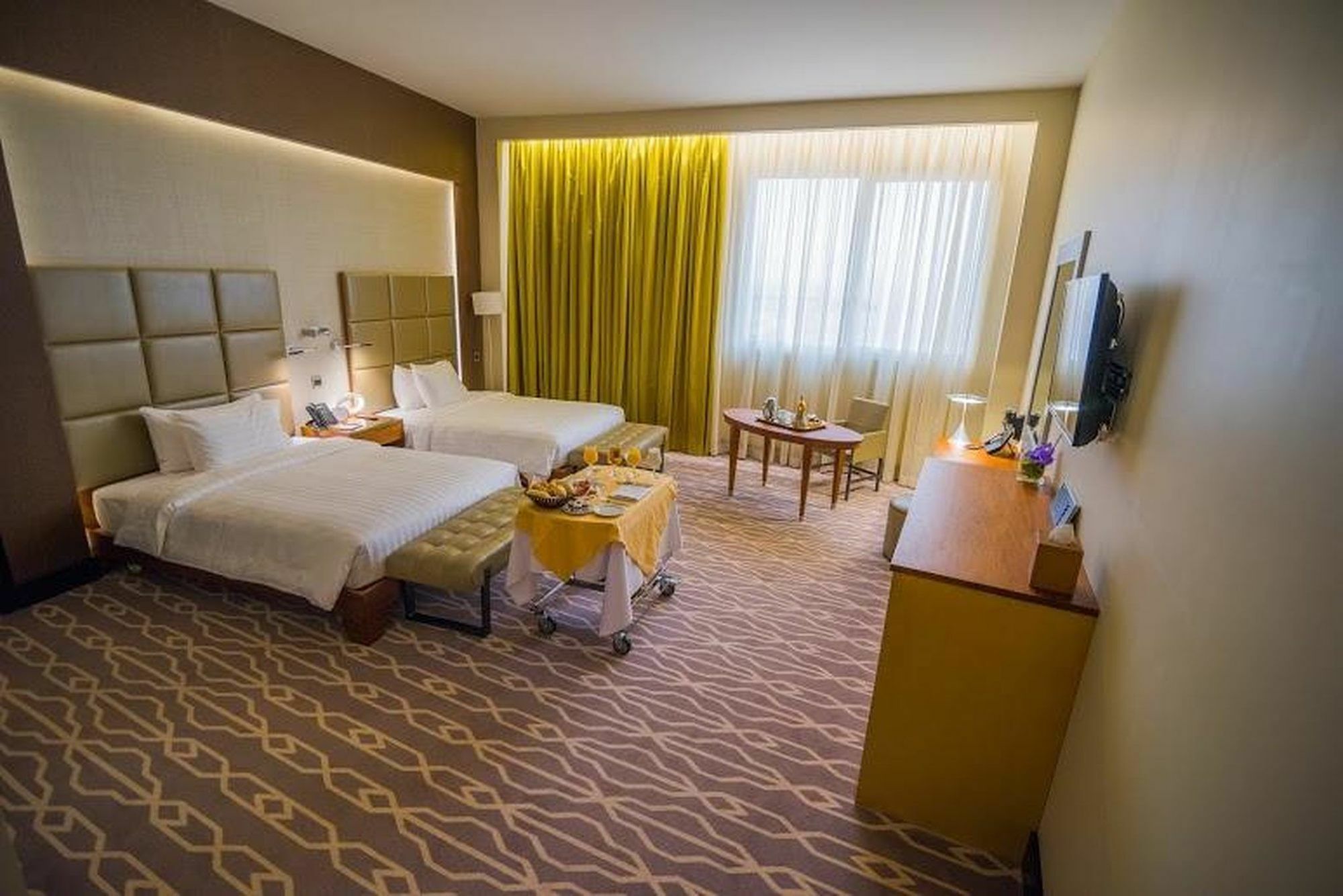 Millennium Hail Hotel Exterior foto A room at the hotel